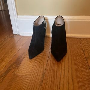 Black, comfortable ankle booties with zipper on side. Practically brand new.